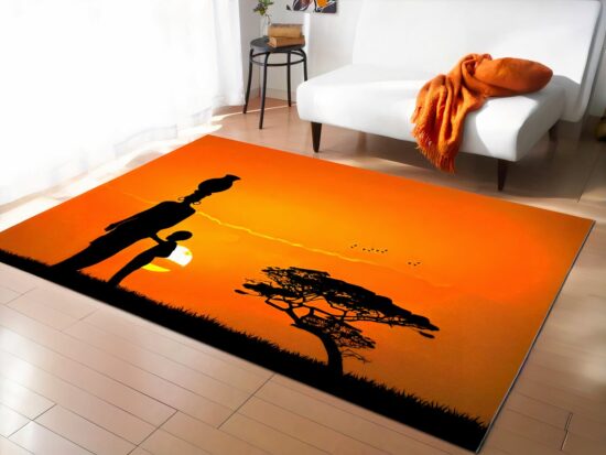 tapis africain femme avec enfant au cocher de soleil dans la savane devant un canapé blanc