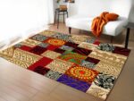 tapis africain motifs traditionnels dans un sallon devant un canapé blanc