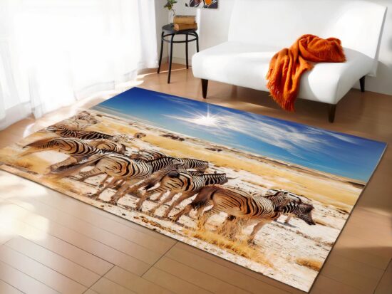 tapis africain zebres dans la savane dans un sallon devant un canapé blanc