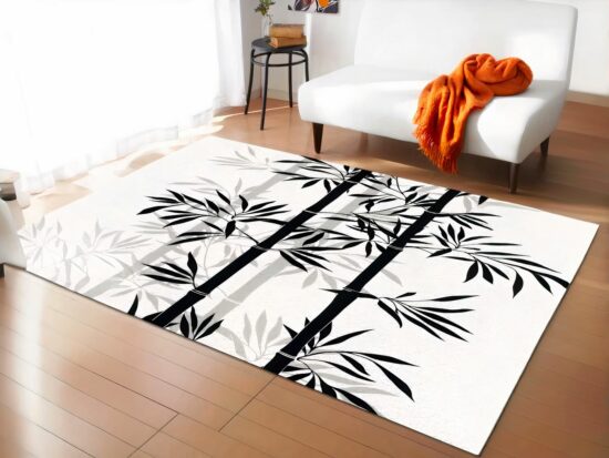 Tapis bambou noir et blanc dans un sallon devant un canapé blanc