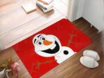 Tapis noël olaf rouge dans une entrée