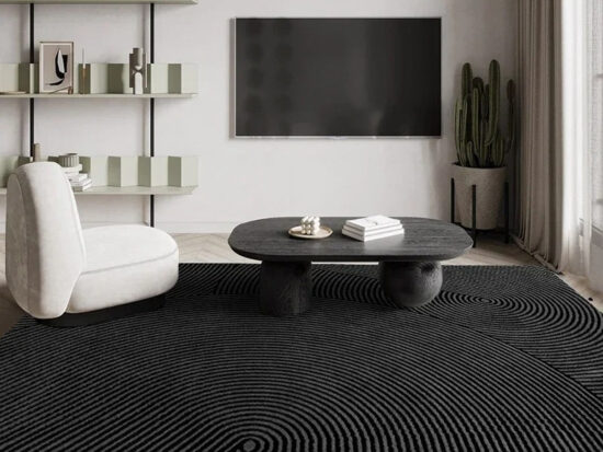 Tapis salon japandi ombre zen noir et rectangulaire dans un salon